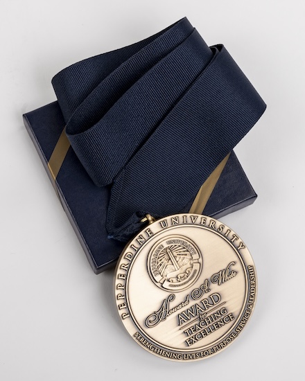 White Award medallion