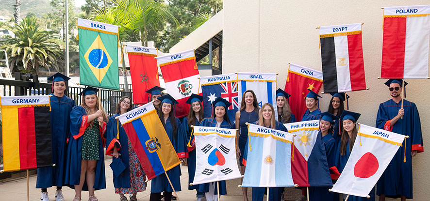 International students gathered with their respective flags