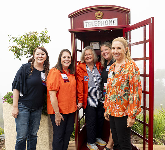 London IP group posing in front of the telephone booth