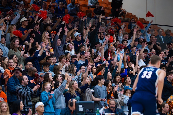 Pepperdine students celebrate success at a Waves basketball game