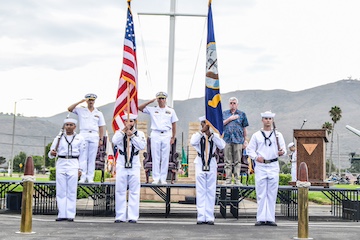 Military members saluting at Ride to Flags event