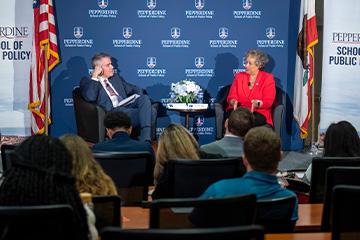 School of Public Policy Dean Pete Peterson and Secretary Kay Coles James