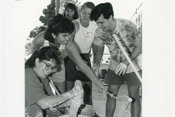 Students paining a High School for Step Forward Day in 1989